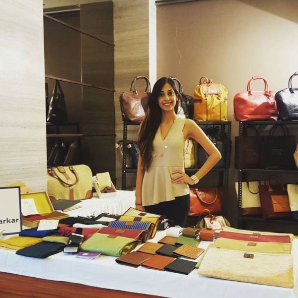 Pallavi Vengsarkar showcasing her handbag collection at an exhibition