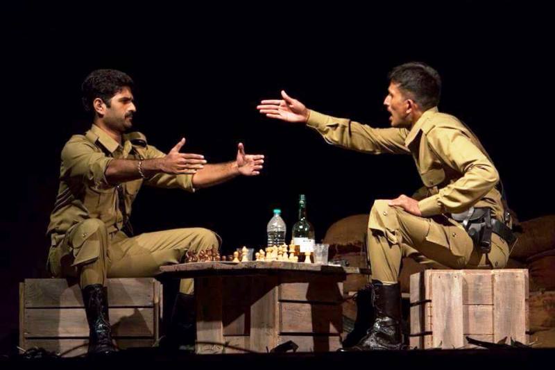 R Badree (left) in a theatre play in 2015