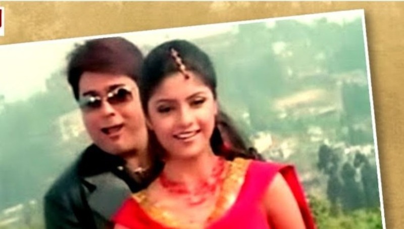 Sayantani Ghosh on the poster of the Bengali movie Raju Uncle