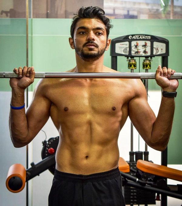 Surya Azad working out in a gym