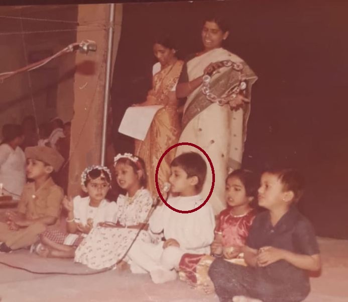 A childhood picture of Amol Kolhe while singing on stage