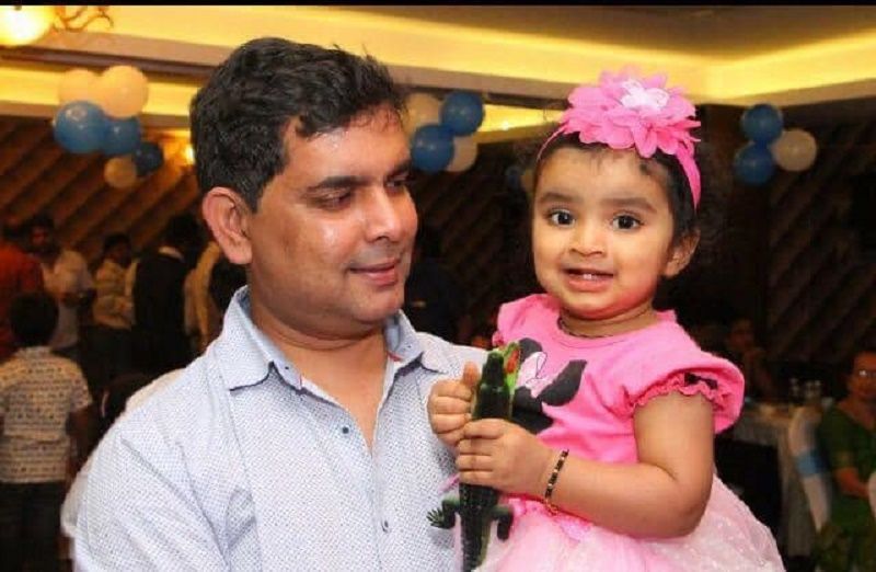 Amit with his daughter