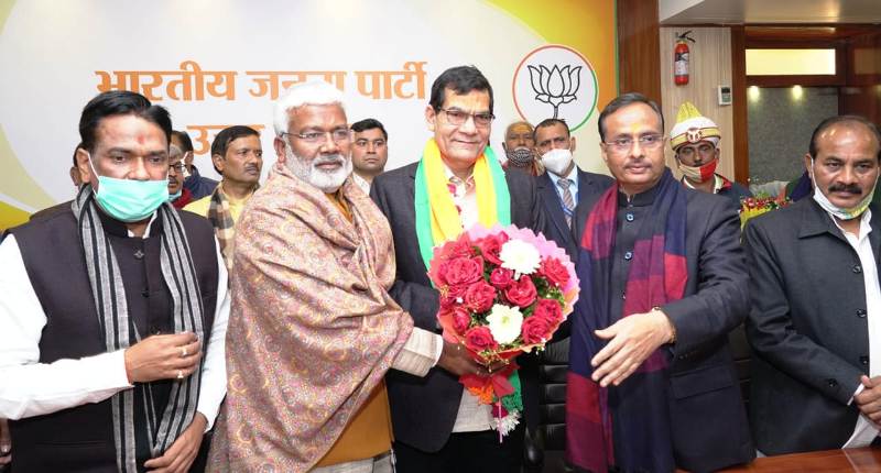 Arvind Kumar Sharma joining BJP in the presence of Swatantra Dev Singh and Dinesh Sharma at BJP’s office, in Lucknow, on 14 January 2021