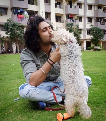 Devesh Sharma with a dog