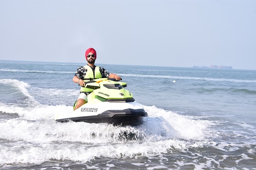 Guneet Jolly riding a jetski