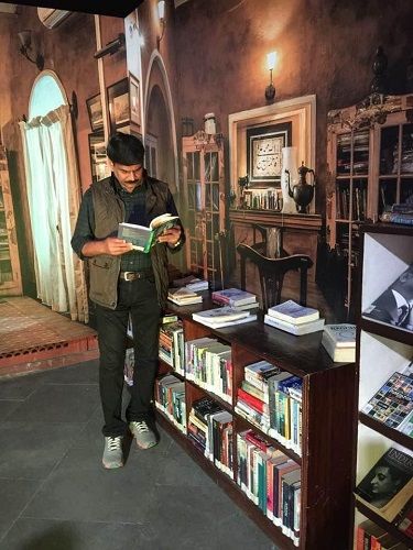 Kamal Khan reading books