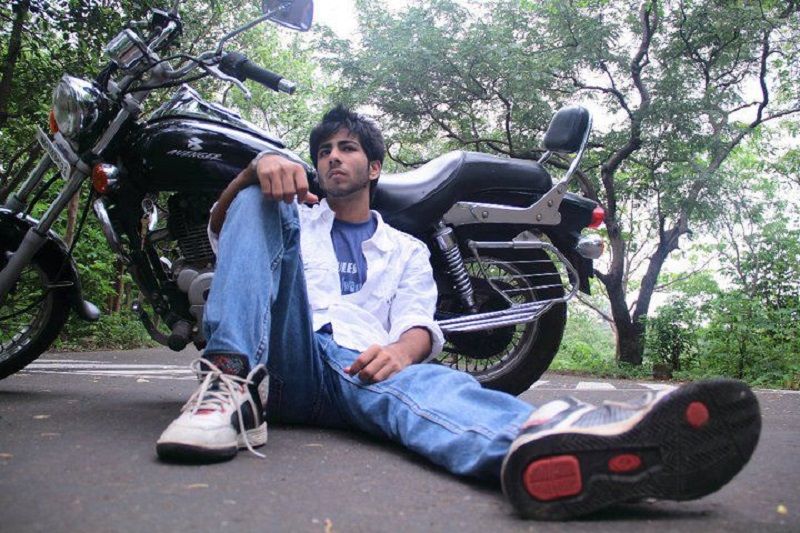 Kapil posing with his bike