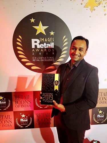 Kaushik Mukherjee with his award