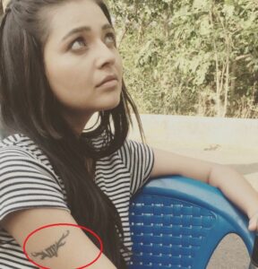 Mansi's tattoo on her right hand