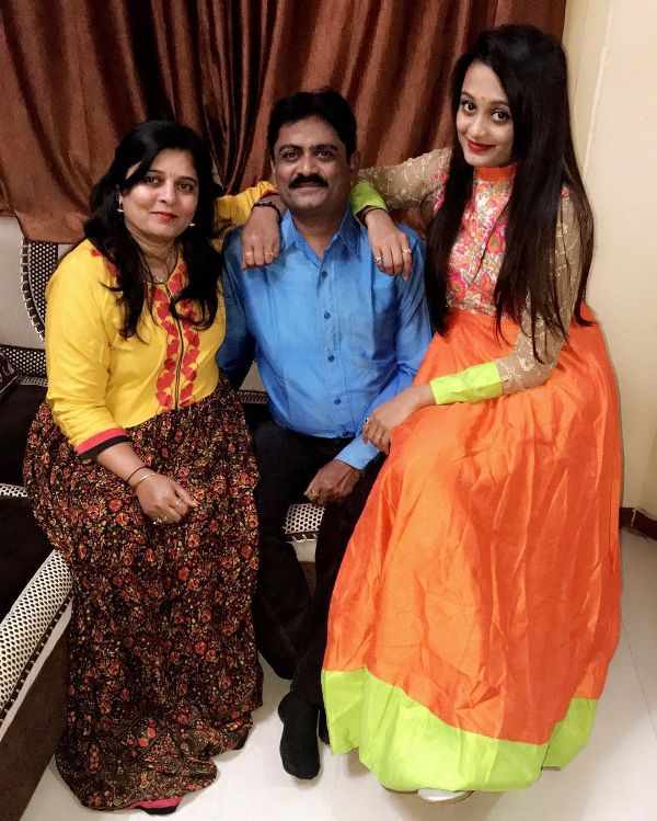 Meha Patel with her parents 