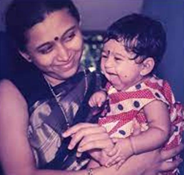 Mrunmayee Deshpande in her mother's lap