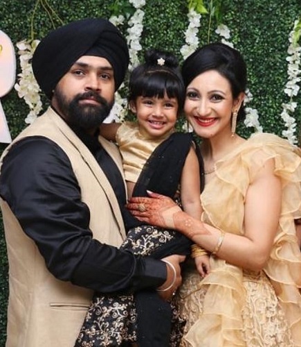 Navdeep Kaur with her husband and daughter
