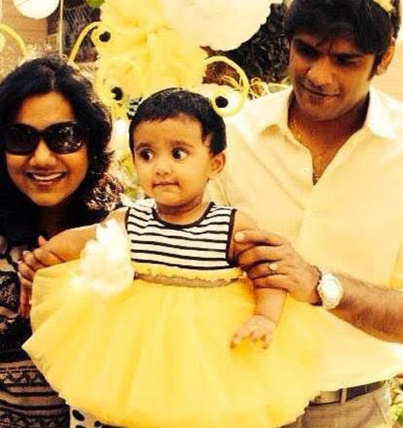 Nidhi Yasha with her husband and daughter