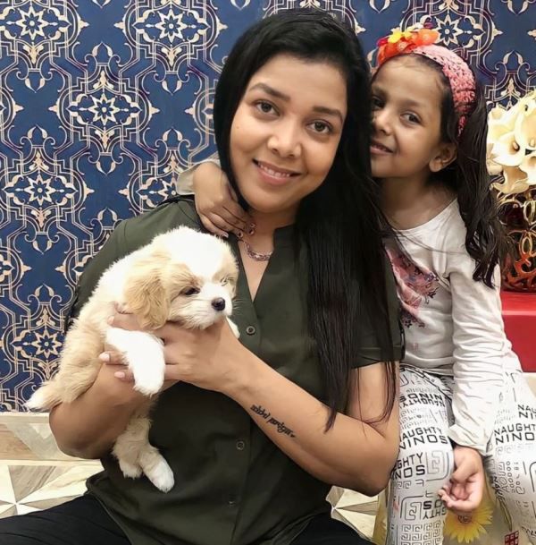 Priyanka Maurya with her daughter and their pet dog
