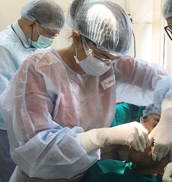 Tracy Alison while operating a patient