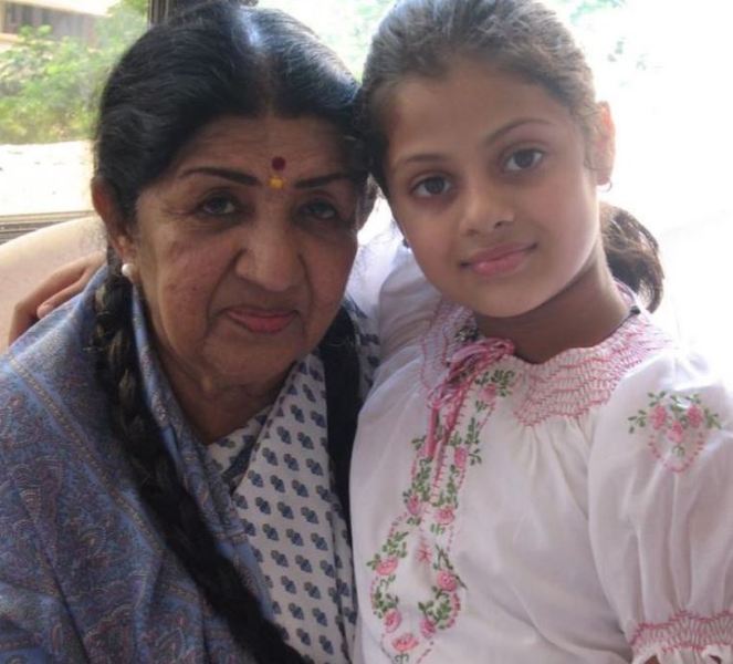A childhood picture of Zanai with Lata Mangeshkar