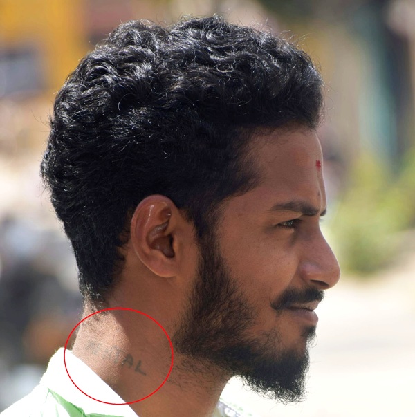Bajrang Dal activist Harsha showcasing his 'Mental' tattoo
