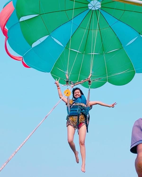 Anjali Arora performing parasailing