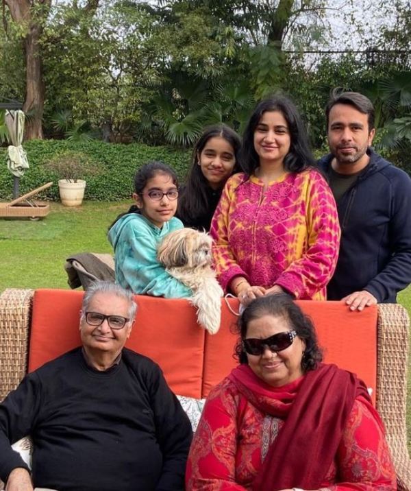 Charu Singh with her parents, daughters, and husband