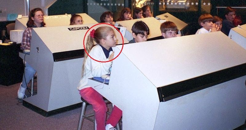 Childhood picture of Anna Menon in the mission control center at NASA's Johnson Space Center