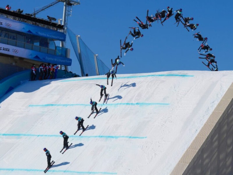 Eileen Gu, competing for China and shown in this multiple photograph composite image, performs a 1440 in her first run of the women’s freeski big air competition at winter Olympics 2022