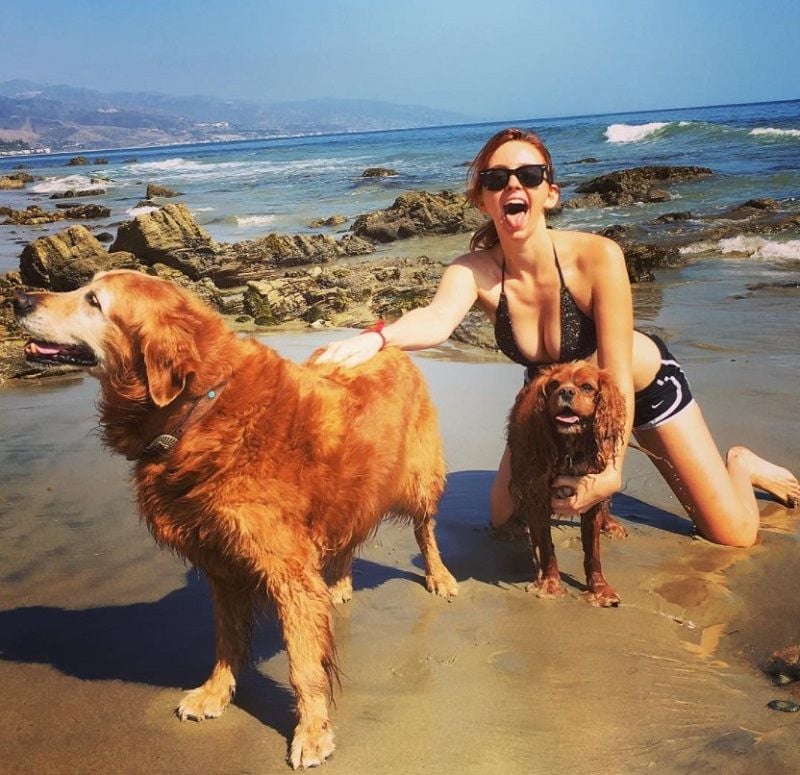 Natasha Bassett posing with her dog