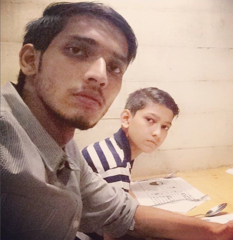 Talhah Anjum with his brother, Umer