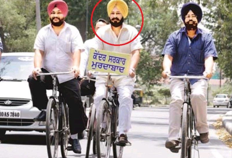 Ajitpal Singh Kohli on a cyle going to file his nomination
