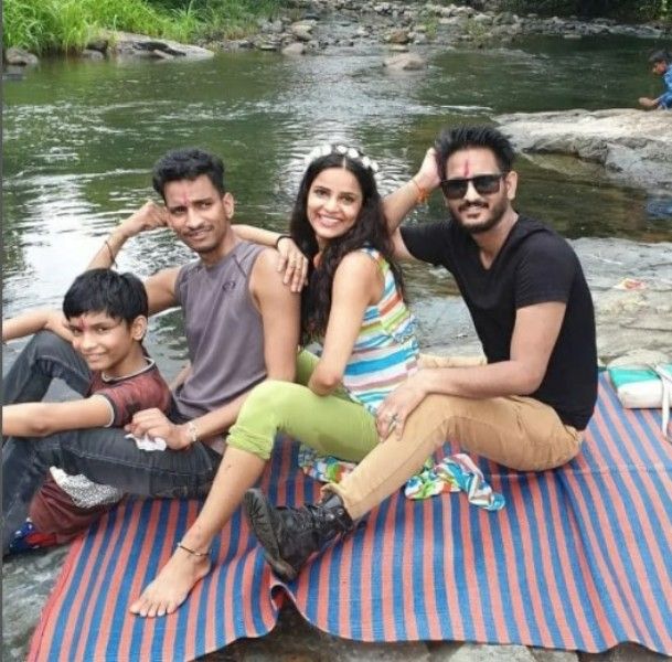 Archana Gautam with her brothers