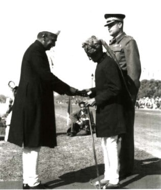 Father of Naik Jadunath Singh, Bir Bal Singh, receiving the PVC on behalf of his son from the President on 26 January 1950