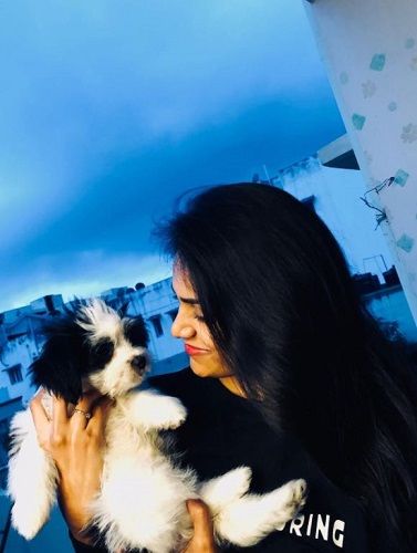 Gayathri with her pet dog