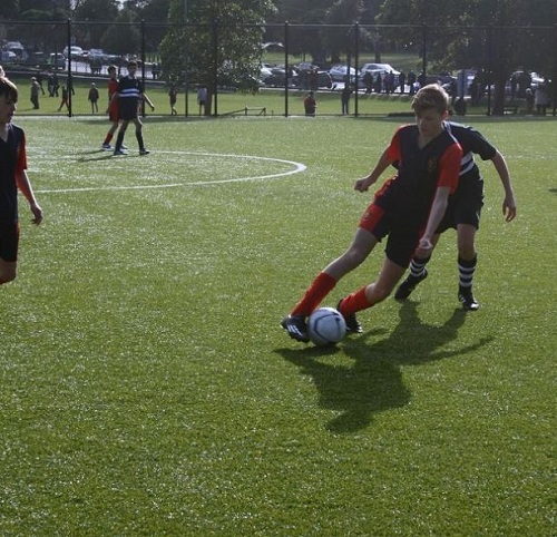 Jackson Warne playing soccer