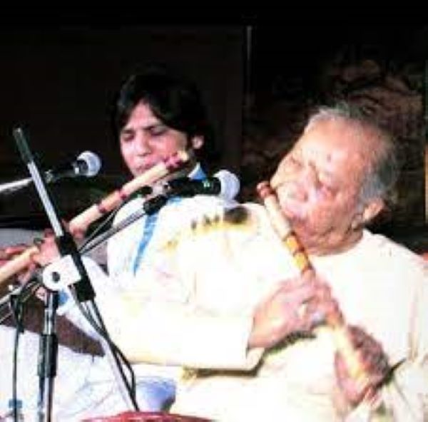 Manuraj Singh Rajput performing a stage show with his music master Hariprasad Chaurasia
