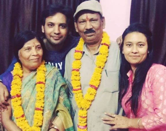 Manuraj Singh Rajput with his mother, father, and sister