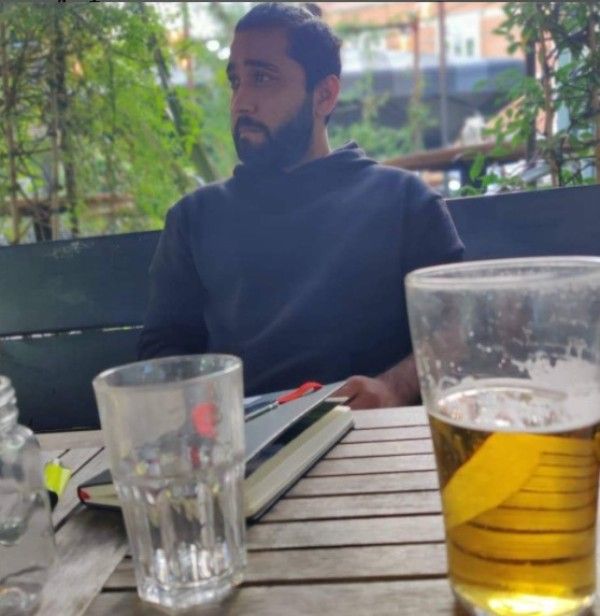 Mayank Pahwa having a glass of beer