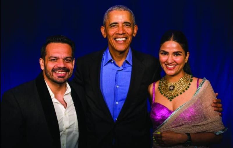 Ritu Rathee Taneja along with her husband, Gaurav Taneja, posing with the former US President Barack Obama