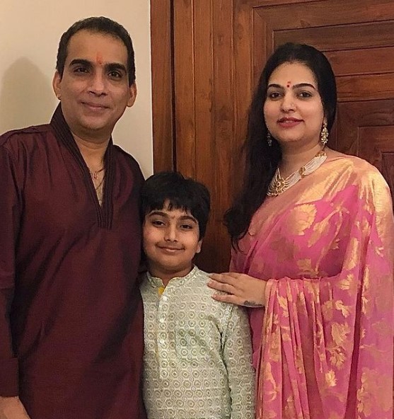 Snehil Mehra with her husband and son