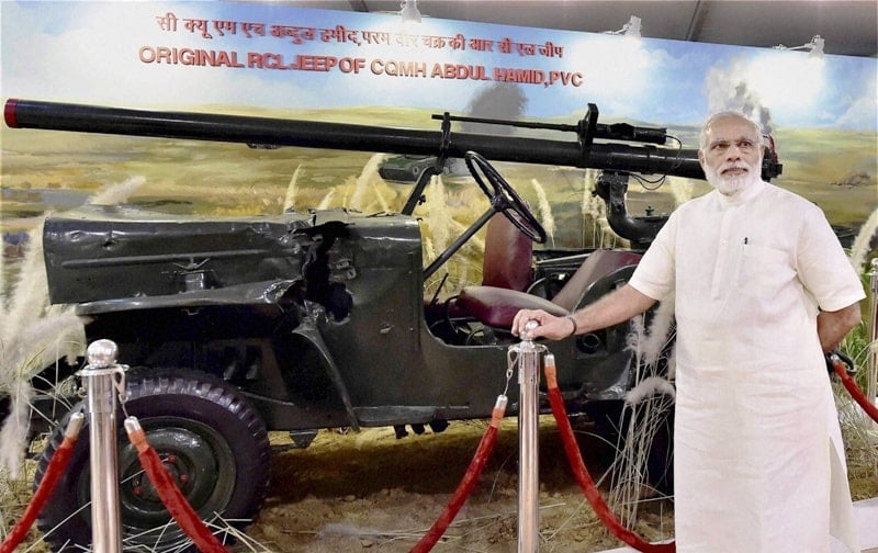 PM Narendra Modi with Abdul Hameed's RCL jeep which was used during the Battle of Asal Uttar