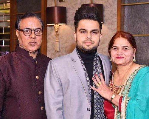 Akhil with his parents