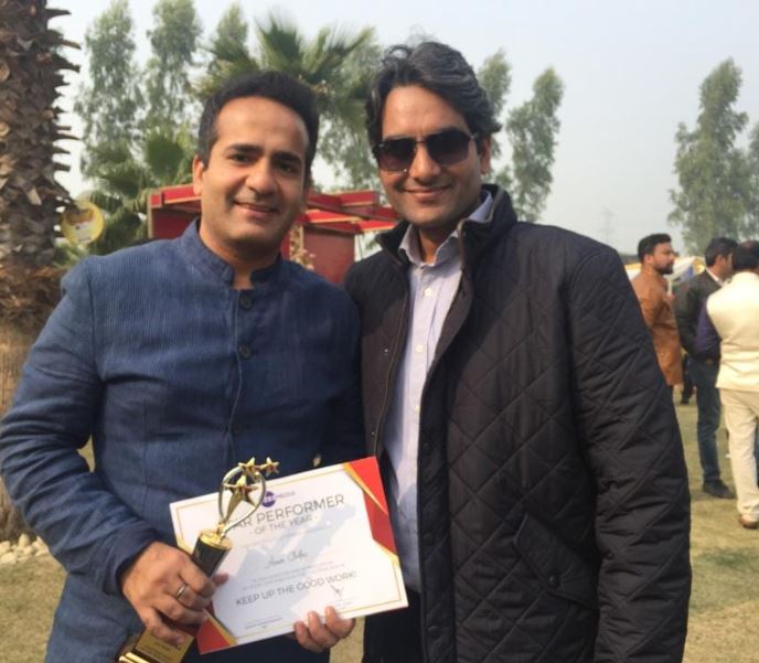 Aman Chopra with his award