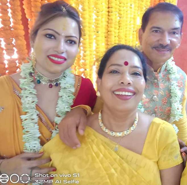 Bulbul Saha with her sister and husband 