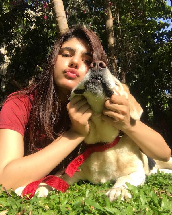 Medha Rana with her pet dog 