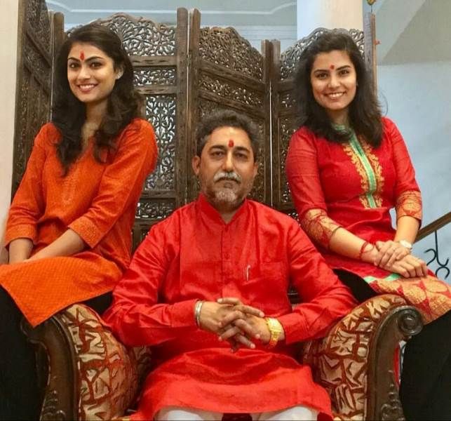Rakesh Pathak with his daughters