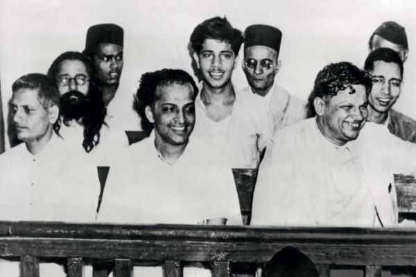 Vinayak Savarkar (wearing a black cap, behind Nathuram Godse and his fellow accused) at the Mahatma Gandhi assassination trial at the special court at the Red Fort, May 27, 1948.