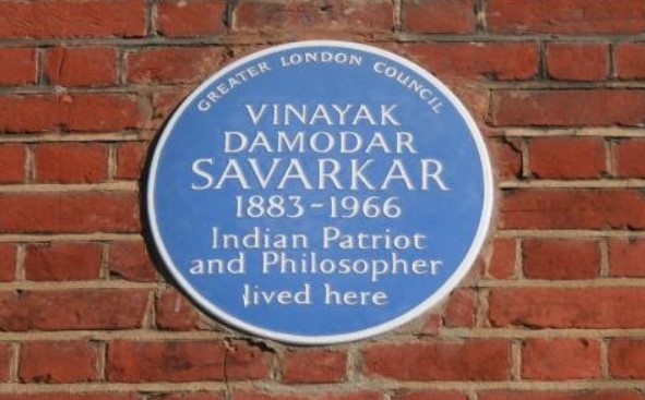 Vinayak Savarkar's name inked on a blue plaque on India House