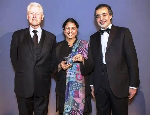Safeena Husain with the then President Bill Clinton, after winning Stars Impact Award