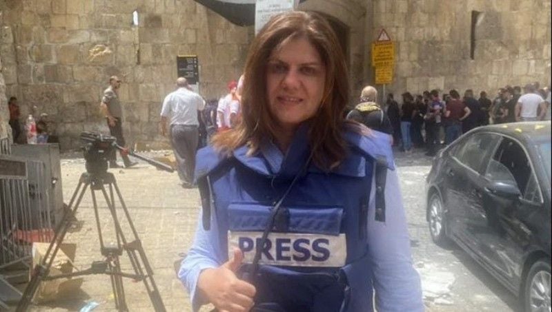 Shireen Abu Aqleh wearing a PRESS jacket