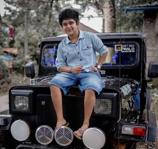 Suraj Thelakkad posing on the jeep