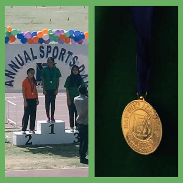 Duaa Aamir with her gold medal at the Annual Sports Day of her school