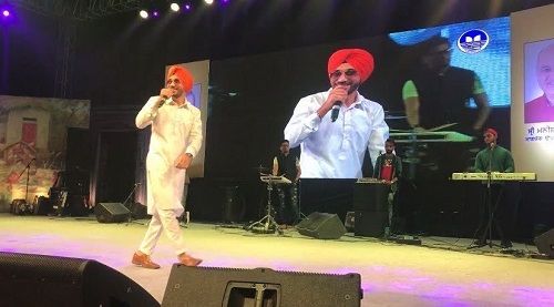 Karandeep Singh performing at a stage show